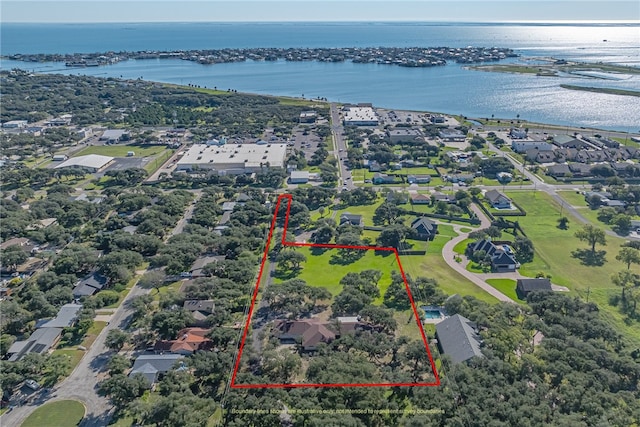 birds eye view of property featuring a water view