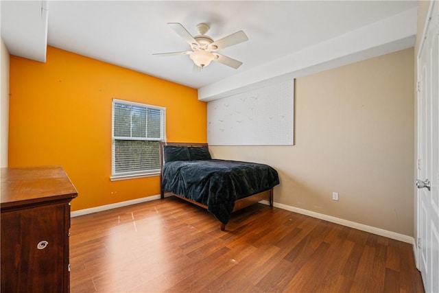 6126 Saint Denis St, Corpus Christi, TX 78414 - bedroom featuring wood finished floors, baseboards, and a ceiling fan