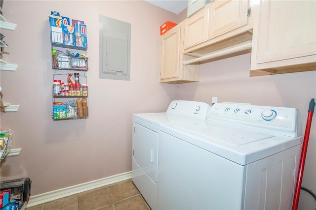 13656 Teague Ln Unit 22, Corpus Christi, TX 78410 - laundry area with washer and dryer, electric panel, cabinet space, and tile patterned floors