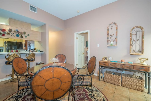 13656 Teague Ln Unit 22, Corpus Christi, TX 78410 - tiled dining area with baseboards