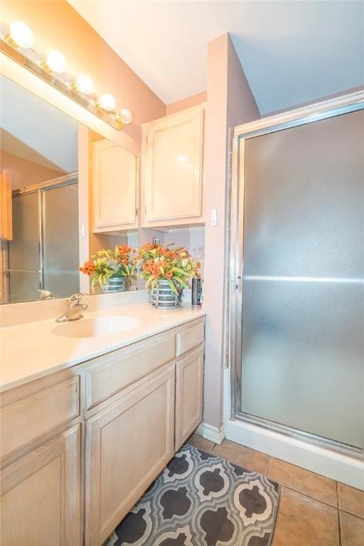 13656 Teague Ln Unit 22, Corpus Christi, TX 78410 - full bathroom with vanity, a stall shower, and tile patterned flooring