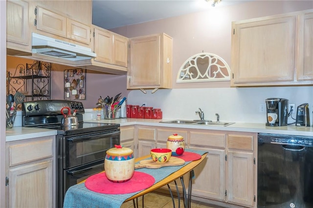 13656 Teague Ln Unit 22, Corpus Christi, TX 78410 - kitchen featuring black appliances, under cabinet range hood, light countertops, and light brown cabinets
