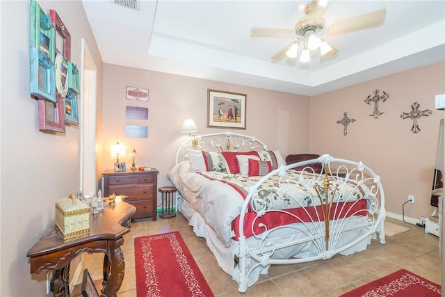 13656 Teague Ln Unit 22, Corpus Christi, TX 78410 - tiled bedroom with a raised ceiling and ceiling fan