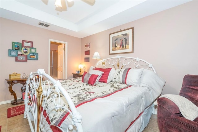 13656 Teague Ln Unit 22, Corpus Christi, TX 78410 - tiled bedroom with a ceiling fan and a tray ceiling