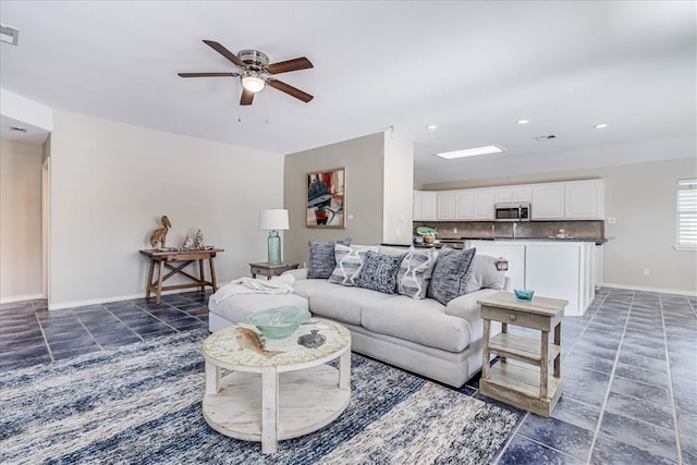 living room with ceiling fan