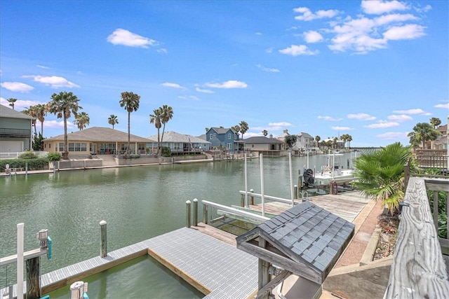 dock area with a water view