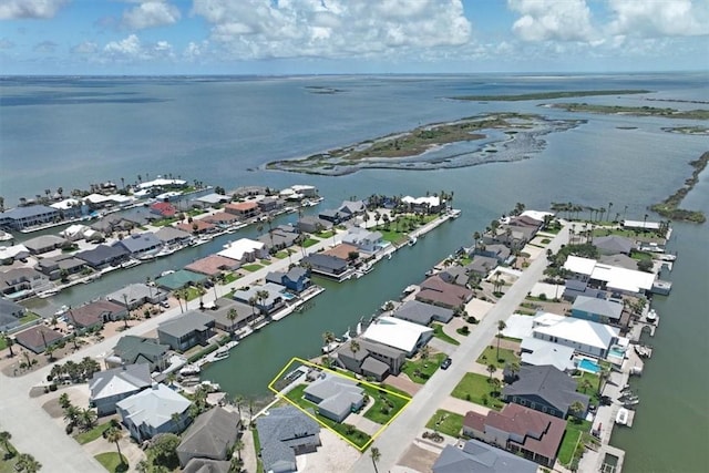 123 Sea Mist Dr, Aransas Pass, TX 78336 - aerial perspective of suburban area featuring property boundaries highlighted and a nearby body of water