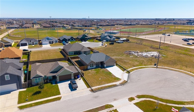 birds eye view of property with a residential view