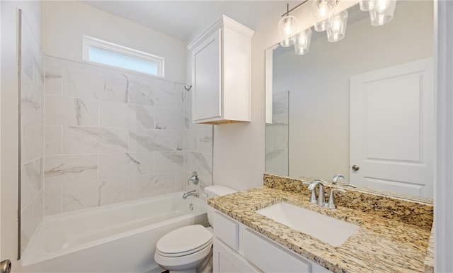 bathroom with toilet, shower / washtub combination, and vanity