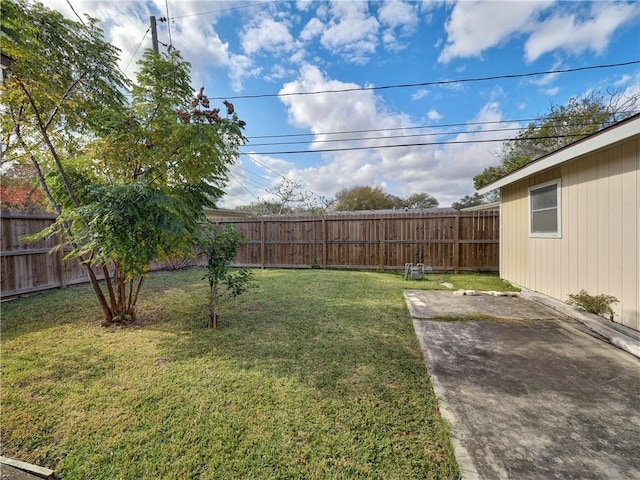 4821 Kosarek Dr, Corpus Christi, TX 78415 - fenced backyard with a patio area