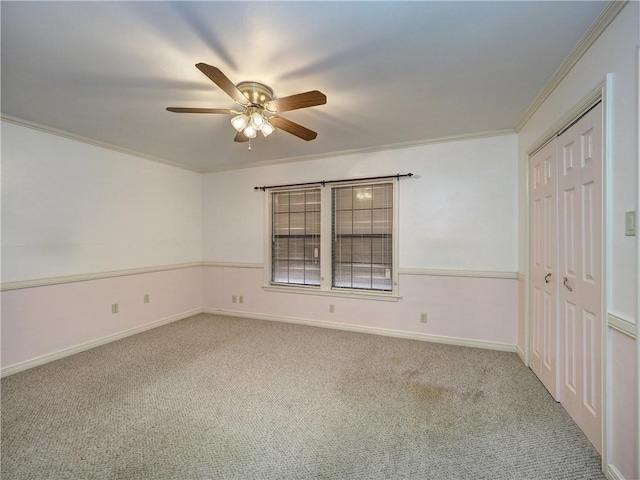 4821 Kosarek Dr, Corpus Christi, TX 78415 - empty room featuring carpet flooring, a ceiling fan, and crown molding