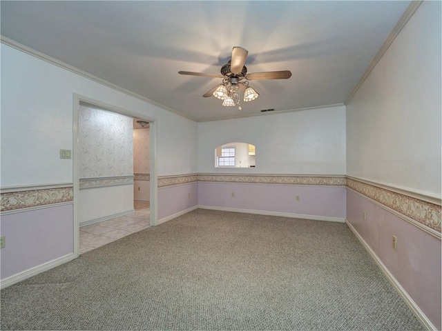 4821 Kosarek Dr, Corpus Christi, TX 78415 - spare room featuring light carpet, a ceiling fan, and crown molding