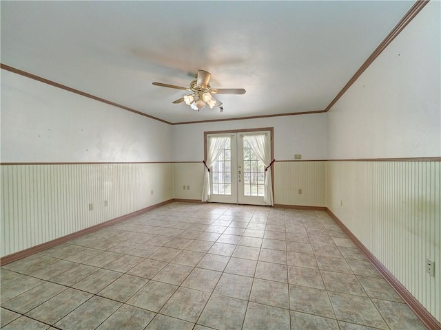 4821 Kosarek Dr, Corpus Christi, TX 78415 - spare room featuring french doors, a ceiling fan, light tile patterned floors, and crown molding