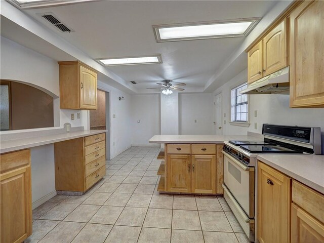 4821 Kosarek Dr, Corpus Christi, TX 78415 - kitchen featuring white electric stove, under cabinet range hood, a peninsula, light countertops, and light tile patterned floors
