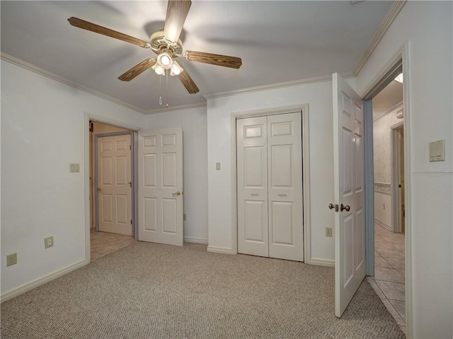 4821 Kosarek Dr, Corpus Christi, TX 78415 - unfurnished bedroom with carpet floors, ornamental molding, a closet, and a ceiling fan