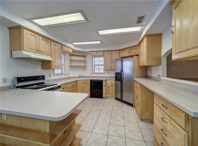 4821 Kosarek Dr, Corpus Christi, TX 78415 - kitchen with under cabinet range hood, electric range oven, stainless steel fridge with ice dispenser, open shelves, and a peninsula