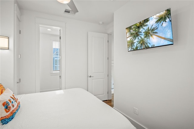 bedroom featuring dark wood-type flooring and ceiling fan