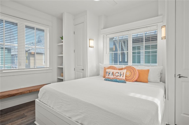 bedroom featuring dark hardwood / wood-style floors