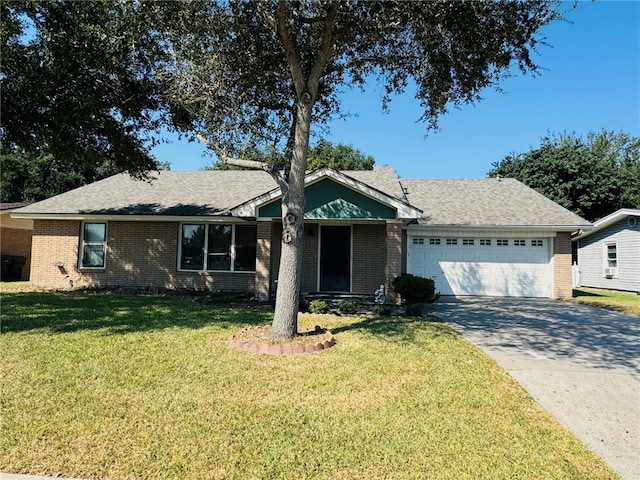 single story home with a garage and a front lawn