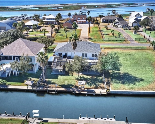 drone / aerial view featuring a water view