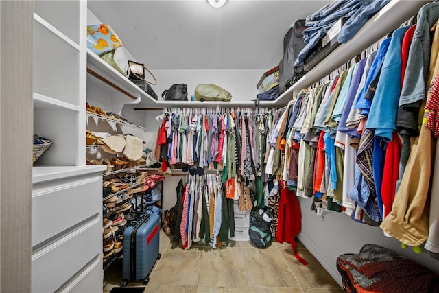 8245 Rock Crest Dr, Corpus Christi, TX 78414 - walk in closet featuring tile patterned floors
