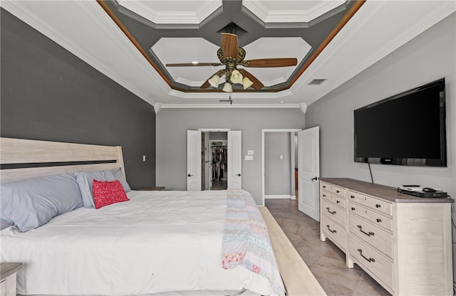 8245 Rock Crest Dr, Corpus Christi, TX 78414 - bedroom with crown molding, a walk in closet, ceiling fan, and light marble finish floors