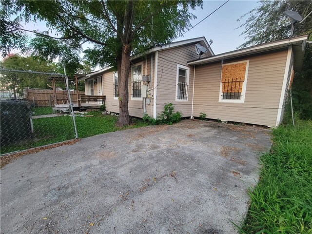 exterior space with a front lawn