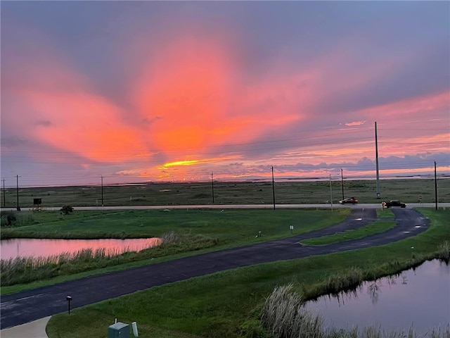 view of property's community with a water view