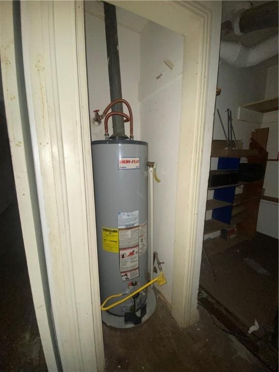 utility room with water heater