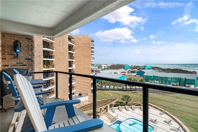 balcony featuring a water view