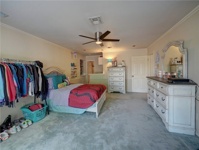 bedroom featuring ornamental molding, light carpet, and ceiling fan