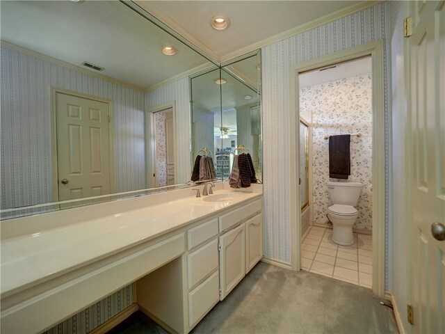 full bathroom with ornamental molding,  shower combination, vanity, tile patterned floors, and toilet