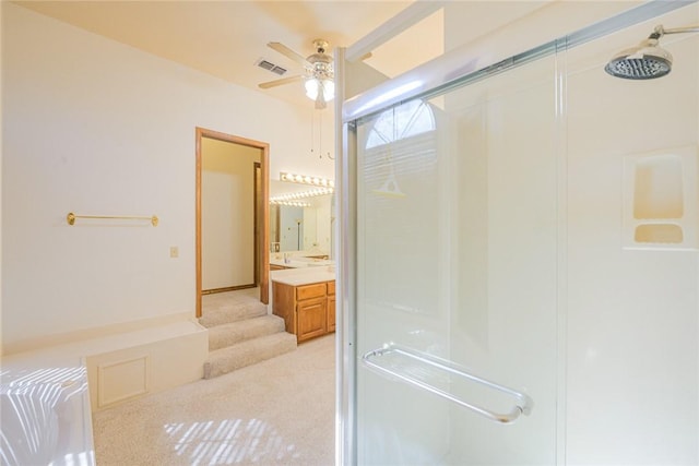 505 Spyglass St, Rockport, TX 78382 - bathroom featuring a stall shower, vanity, visible vents, and a ceiling fan