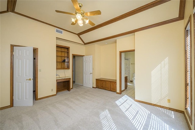 505 Spyglass St, Rockport, TX 78382 - unfurnished bedroom featuring light colored carpet, visible vents, lofted ceiling, and baseboards