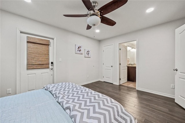 bedroom featuring wood finished floors, baseboards, recessed lighting, ensuite bathroom, and a ceiling fan