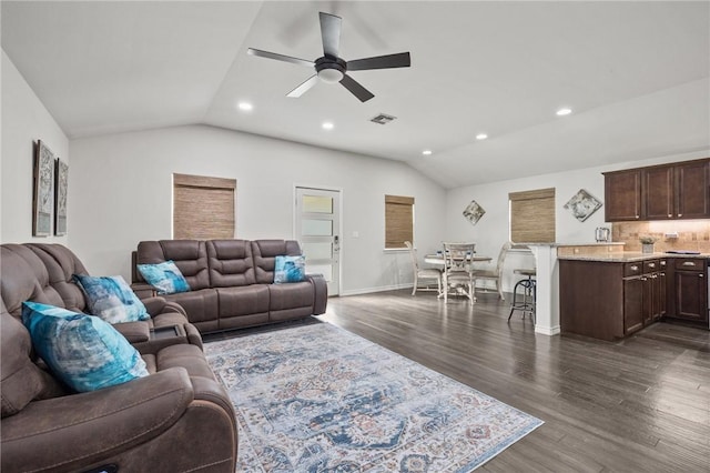 living area featuring vaulted ceiling, ceiling fan, dark wood-style floors, recessed lighting, and baseboards