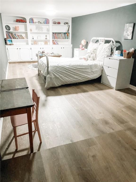 1801 Clare Dr, Alice, TX 78332 - bedroom featuring light wood-style floors