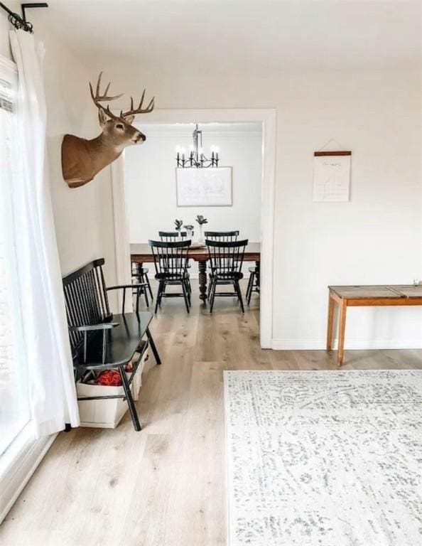 1801 Clare Dr, Alice, TX 78332 - dining room with wood finished floors and a chandelier