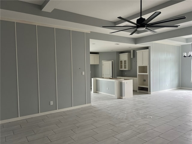 unfurnished living room featuring light wood-type flooring and ceiling fan with notable chandelier