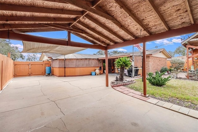 view of patio / terrace with a shed