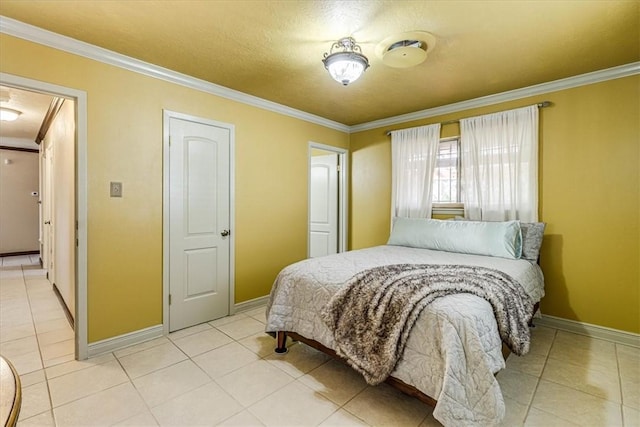 bedroom featuring crown molding and light tile patterned floors