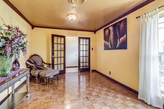 living area featuring light parquet floors, ornamental molding, french doors, and a textured ceiling