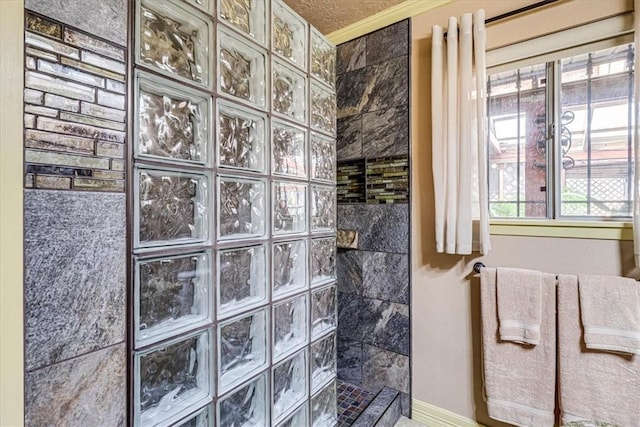 bathroom featuring a tile shower