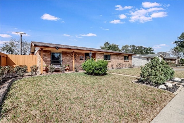 ranch-style house with a front lawn