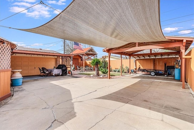 view of patio featuring a carport