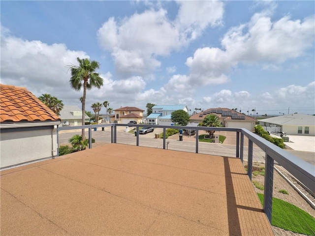 view of patio / terrace with a residential view and a balcony