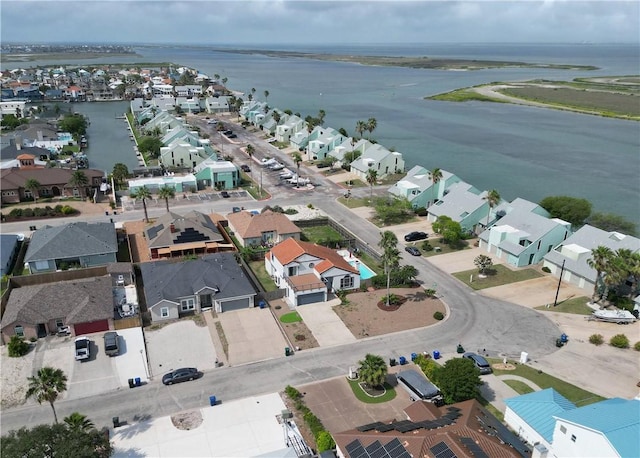 bird's eye view featuring a water view and a residential view