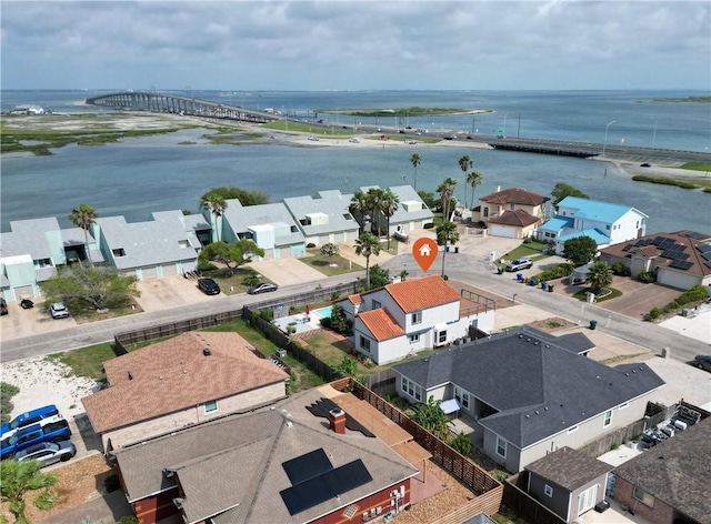 bird's eye view featuring a water view and a residential view