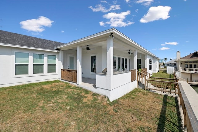108 Bay Harbor Dr, Aransas Pass, TX 78336 - rear view of property with a ceiling fan and a shingled roof