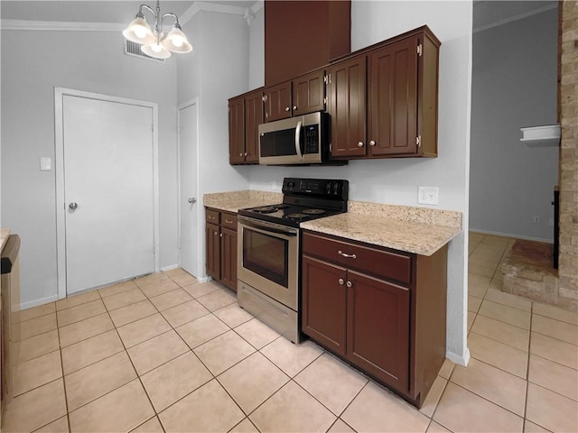 kitchen featuring appliances with stainless steel finishes, a chandelier, crown molding, and pendant lighting